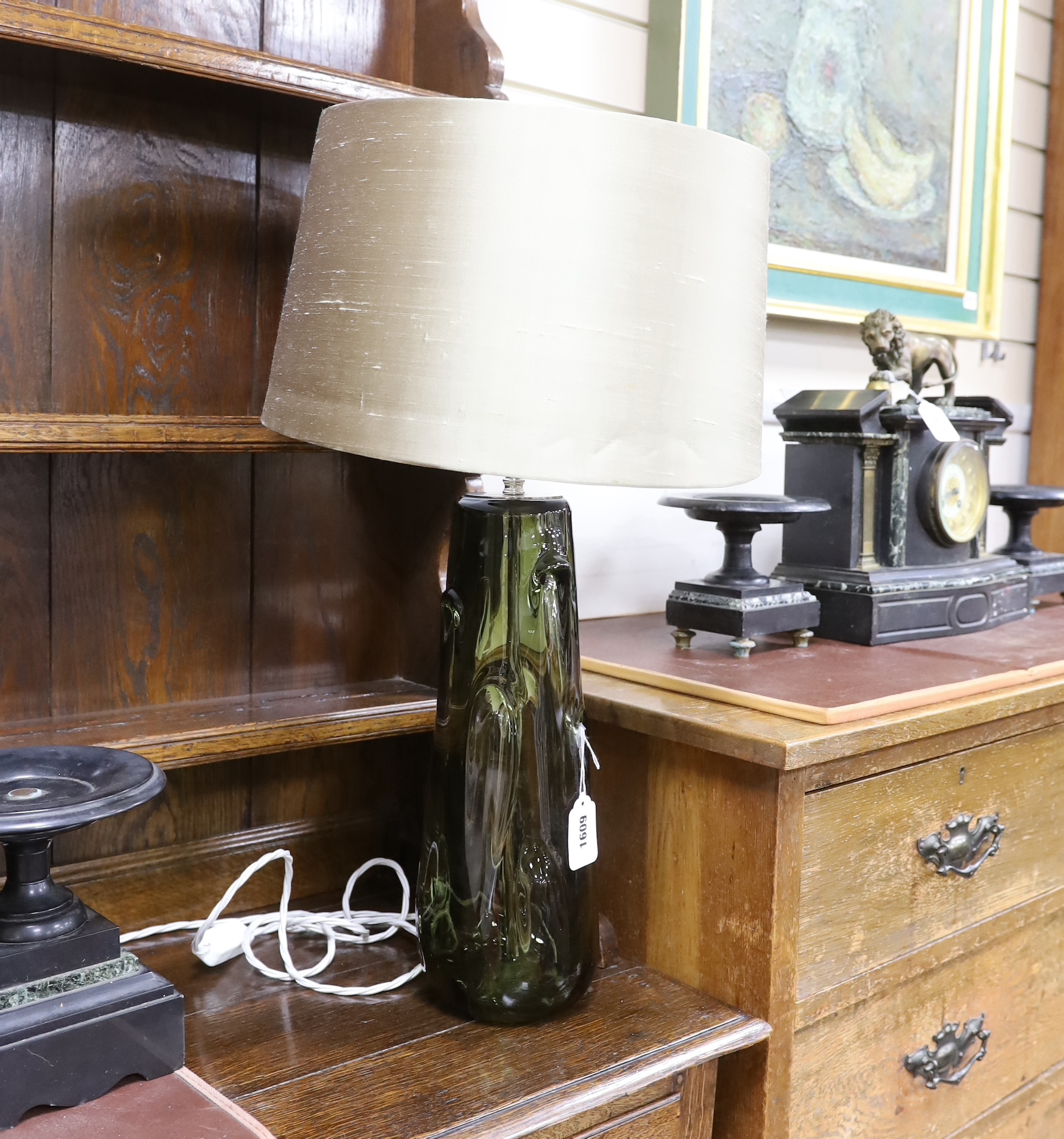 A pair of Whitefriars type green glass table lamps, 39cm high excluding light fitting